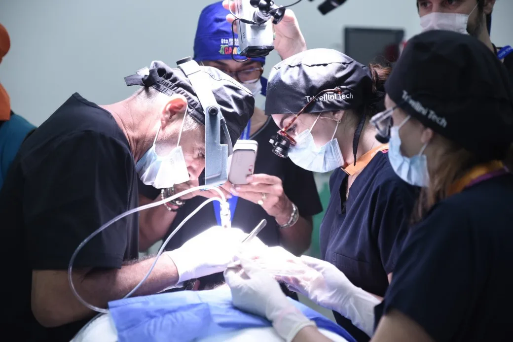 Dr. Trivellini performing Long Hair FUE — long-hair implantation technique